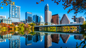 Downtown Austin skyline reflected on lake