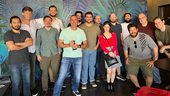 brinqa colleagues gathered together