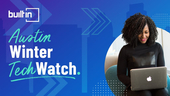 A branded image of a woman on a laptop.