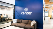The Center logo on display in the entry to the company's offices