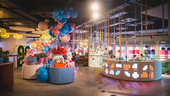 Photo of balloons and streamers throughout Bringg’s office space.