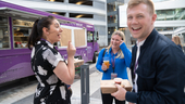 Imprivata teammates laughing together beside a food truck