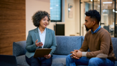 Financial advisor having a meeting with a client man in the office.