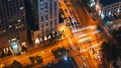 Aerial view of a Chicago street intersection at night.