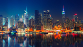 Panoramic view of Manhattan skyline at night