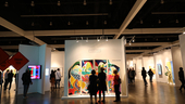 People looking at art.