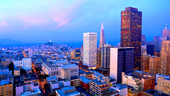 San Francisco cityscape with a view of famous skyscrapers and landmarks with colorful clouds at dusk