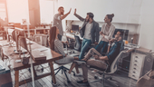A sales team celebrates its wins together.