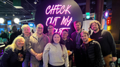 Pinwheel team members posing for a group photo while at a team outing