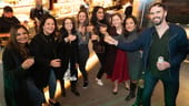 Immersive Labs group photo at a restaurant