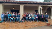 The SmarterX team gathers for a photo.