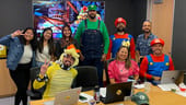 Pennymac Tech team members dressed as Mario Bros. characters