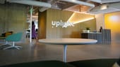 photo of uplight's office lobby with tables and chairs