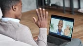 A patient meets with a therapist via a telehealth platform.