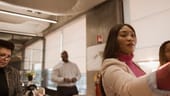 Photo of McKinsey employees in the office.