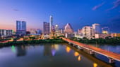A nighttime photo of the Austin skyline.