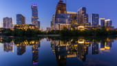 A nighttime photo of the Austin skyline.