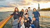 The Giant Machines team on a boat in New York City