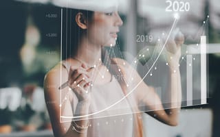 A woman analyzing trend statistics