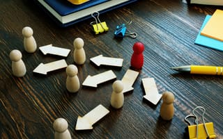 Wooden pieces symbolizing team structure.