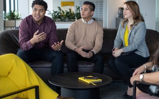 western union team members sitting together