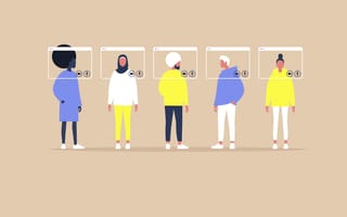Five people in front of screens. Several are wearing turbans or hijabs.