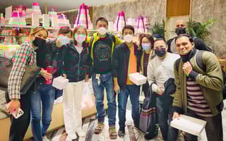 Dave team members gathered for team outing wearing masks