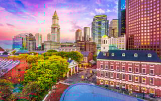 A view of the Boston skyline at sunset.
