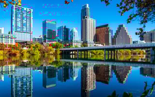 Downtown Austin, Texas skyline reflecting on Lady Bird Lake.