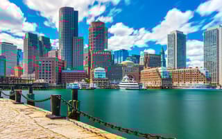 View of downtown Boston skyline from the harbor on a sunny day