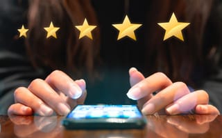 Close up of a girl leaving a 5 star rating on a mobile app