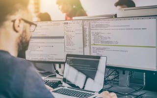 Programmer working in a software develop company office.