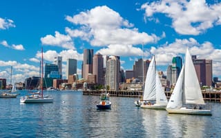 Boston skyline from Piers Park with sailboats in the water