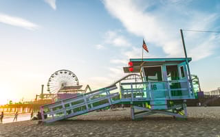 A lifeguard stand on the beach near the Santa Monica Pier.