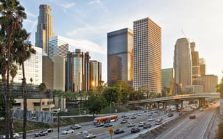 Los Angeles skyline at sunset form the 110 freeway