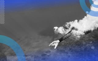 person swimming underwater in ocean