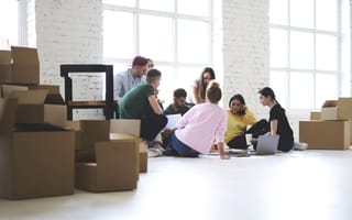 A company that has just moved boxes into their new office.