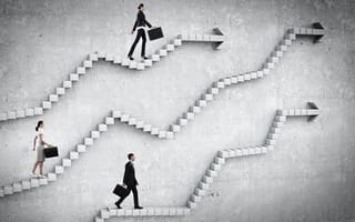 Business people walking up steps with an arrow at the end, climbing the career ladder