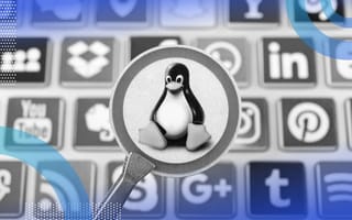 A magnifying glass highlights the Linux penguin logo