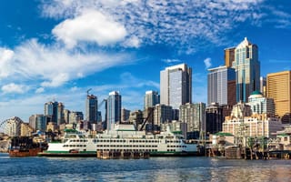 Panoramic view of Seattle cityscape at Elliott Bay in a sunny day, Washington, USA
