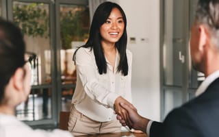 Interviewee shaking hands with an interviewer