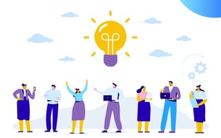 Seven people holding computers and phones underneath a yellow lightbulb