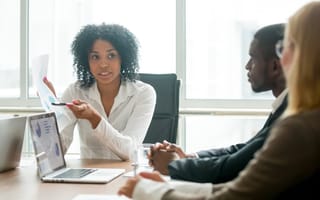 Colleagues having a team meeting