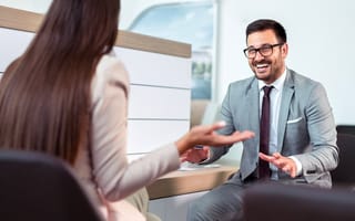 a salesperson talking to a client