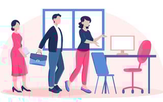 An illustration of a new employee being shown to her desk by a member of human resources.