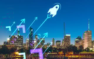Downtown Chicago skyline with overlay of illustrated rocket ship launching