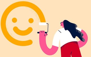 Illustration of a girl painting a smile face on a wall
