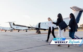 People walk to a Surf Air Mobility turboprop plane
