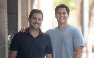 Relevize co-founders Michael Nardella and Peter Sidney stand outside a building