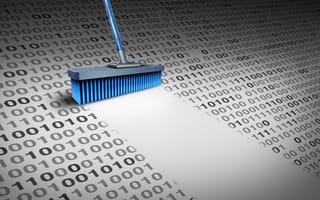 A broom sweeping through lines of code, creating a clean blank line in its wake.